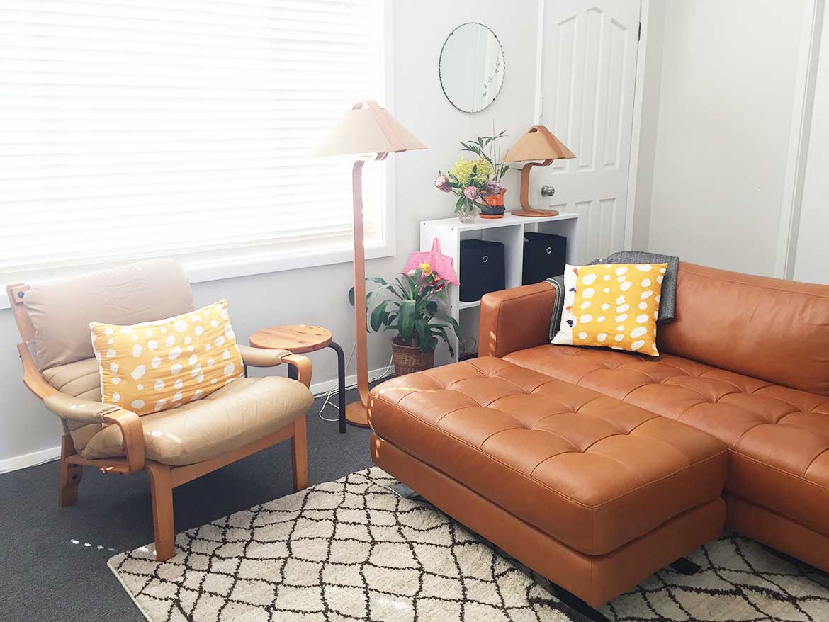 Living Room With Caramel And Green