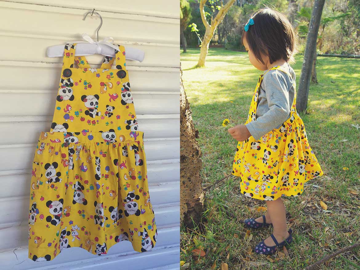 Kids Apron Dress Sewing Pattern | This adorable pinafore apron dress is from the Japanese sewing pattern book, A Sunny Spot. I made it out of a panda print fabric for my daughter's second birthday. See more photos at www.sewinlove.com.au